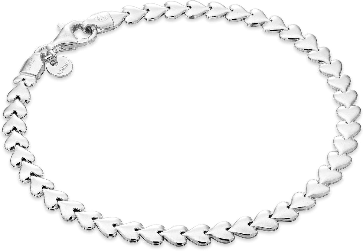 Sterling silver heart link bracelet in a flat tennis style row, 6.5 inch length